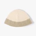 Knitted bucket hat in beige and olive green zigzag pattern for winter warmth - Cream