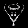 Three-piece silver bridal jewelry set with sparkling crystals on black background - 501+746 Silver 3-Piece Set