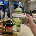 Green large capacity straw cup with cartoon big mouth design and pink silicone sleeve - Belly Cup + Yellow Big Mouth / Green