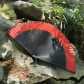 Classical folding fan in red and black gradient with hollowed-out carved bamboo ribs - Red