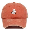 Macro detail of cartoon ghost embroidery on terracotta washed cotton baseball cap - Orange