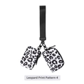 Detail of leopard print nylon wrist bag with dual zip compartments and metal clasp - Leopard Print