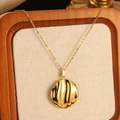 Golden starfish necklace with irregular textured round pendant on minimalist O-chain - Gold Ripple Texture Circular Pendant Necklace