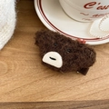 Gros plan d'une pince à cheveux ours en peluche marron avec texture douce en laine d'agneau - Pince Bec de Canard Ours / Marron