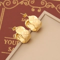 Detailed view of golden geometric earrings with quilted lattice pattern on jewelry box - Quilted Lattice Style (6#)