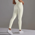 Detalle de mallas de yoga de cintura alta con textura de panal para efecto realce - S / Blanco