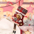 Detail of red plaid Christmas stocking with 3D plush bear and embroidered holiday text - E4-1 Medium Hanging Leg Sock Bear