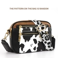 Crossbody bag with cow print pattern, multi-layered zippers and golden hardware - Double Zipper Cow Print Black Brown