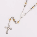 Detailed close-up of a silver and gold metal rosary necklace with a crucifix and medal - Two-tone (Gold & Silver)