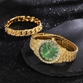 Macro shot of luxury iced-out gold watch with green dial and matching Cuban link bracelet - Gold / Green Watch + Bracelet