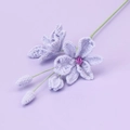 Handmade crochet flower ornament in light purple yarn featuring two main blooms and buds - Purple