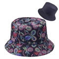 Detailed view of reversible bucket hat with colorful tie-dye leopard print and solid black - Colorful Abstract Print (Style 1)