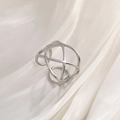 Detailed close-up of a silver irregular geometric ring on white silk background - Silver Tone Hollow Geometric Line
