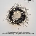 Set of four 6m warm white LED firecracker string lights with 8-mode remote and plugs - 24m 800LED Plug-in Set / Black Wire Warm White