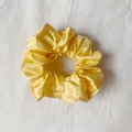 Elastic satin scrunchie in bright yellow silk fabric with elegant ruched texture - Dark Yellow