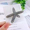 Silver alloy starfish hair clip with full rhinestone inlay on premium white card - White Starfish