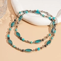 Nahaufnahme der Boho-Perlenkette mit blauen Steinperlen und facettiertem Glas - Blau Perlen
