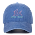 Detailed close-up of pink silhouette embroidery on blue washed denim baseball cap - Light Blue
