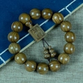 Sandelholz Armband in Olivgrün mit quadratischem Anhänger und kleinen Kürbis-Anhängern - Plakette + Zubehör / 15mm x 15 Stk