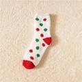 Cozy coral fleece Christmas socks featuring festive red and green polka dots on white - Embroidered JOY