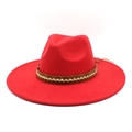 Detail of red wide-brim wool fedora hat featuring a brown braided band on white background - Red