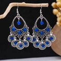 Detailed shot of Bohemian silver drop earrings with turquoise beads on a natural background - Antique Silver + Blue Beads Multi-layer (E5775-3)