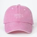 Pink washed cotton baseball cap with Perfectly Imperfect white embroidery design - One Size / Washed Pink