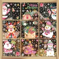 Christmas window decals set featuring Santa Claus, snowmen, and reindeer designs - 9-Sheet Value Set