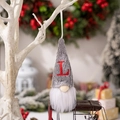 Christmas gnome ornament with grey knitted hat featuring a red embroidered letter L - Letter L