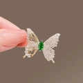 Elegant butterfly brooch in golden finish with green stone and clear zircon crystals - 221 Butterfly