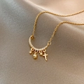 Golden titanium steel necklace featuring crescent moon, cross, and star charms on silk - Titanium Steel Gold Style (X480)