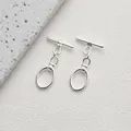 Macro detail of silver plated 14K gold OT toggle clasp for DIY jewelry making - Style F Oval Link / Silver