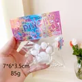 Weiches Katzenpfoten Squishy Spielzeug in Weiß mit Glitzer und Perlen, Gewicht 85g - Weißer Kristall Katzenpfote
