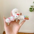 White plush hair claw clip featuring Hello Kitty dolls and Toy Story logo decor - White Plush Cartoon Cat Hair Claw