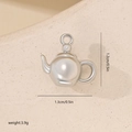 Macro shot of a tiny silver teapot pendant with zirconia and precise size measurements - Teapot Style White Gold (MYYX00668)