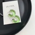 Light green jelly texture C-shaped hoop earrings with transparent resin finish - Green