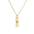 Detail shot of golden rectangular pendant with letter W in colorful rhinestones - Letter W