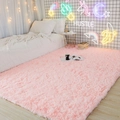 Plush rectangle pink shaggy area rug for bedroom floor in modern minimalist interior style - Pink