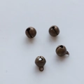 Detail of four bronze metal bells with hanging rings on a clean white background - 8mm / Bronze