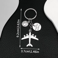 Silver travel keychain with airplane and globe charms, measuring 9.2cm in length - Large Airplane Globe Nomatterwhere Plate (ER679)
