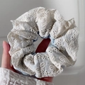 Elegant light blue floral scrunchie with white lace embroidery and delicate wavy edges - Double Lace Blue