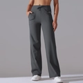 Detail view of high waist yoga pants showing side pockets and drawstring closure - S / Dark Gray