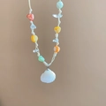 Detail of colorful beads and a natural white shell pendant on a summer beach necklace - Style 13-White-Yellow (Colorful Gravel Scallop)