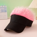 Creative black baseball cap with pink wig hair decoration on a soft pastel background - Black+Pink Hair