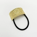 Elastic black hair tie featuring an irregular textured gold zinc alloy fastener - Wrinkled Gold Square