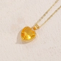Elegante collar con colgante de corazón de oro y gema de cristal amarillo para mujer - Circonita Amarilla