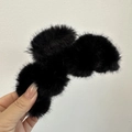 Plush black faux fur claw clip for women featuring a soft and fuzzy vintage winter design - Black