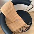 Close-up of light orange plaid scarf with fringe and blue heart Jennie embroidery - Small Heart Yellow