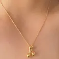 Elegant gold cherry pendant necklace featuring a minimalist leaf design on a fine O-chain - Gold Cherry Necklace (D1384)