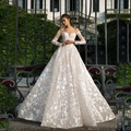 Lace off-shoulder trouwjurk met lange mouwen en een champagnekleurige tule rok - US 2 / Wit